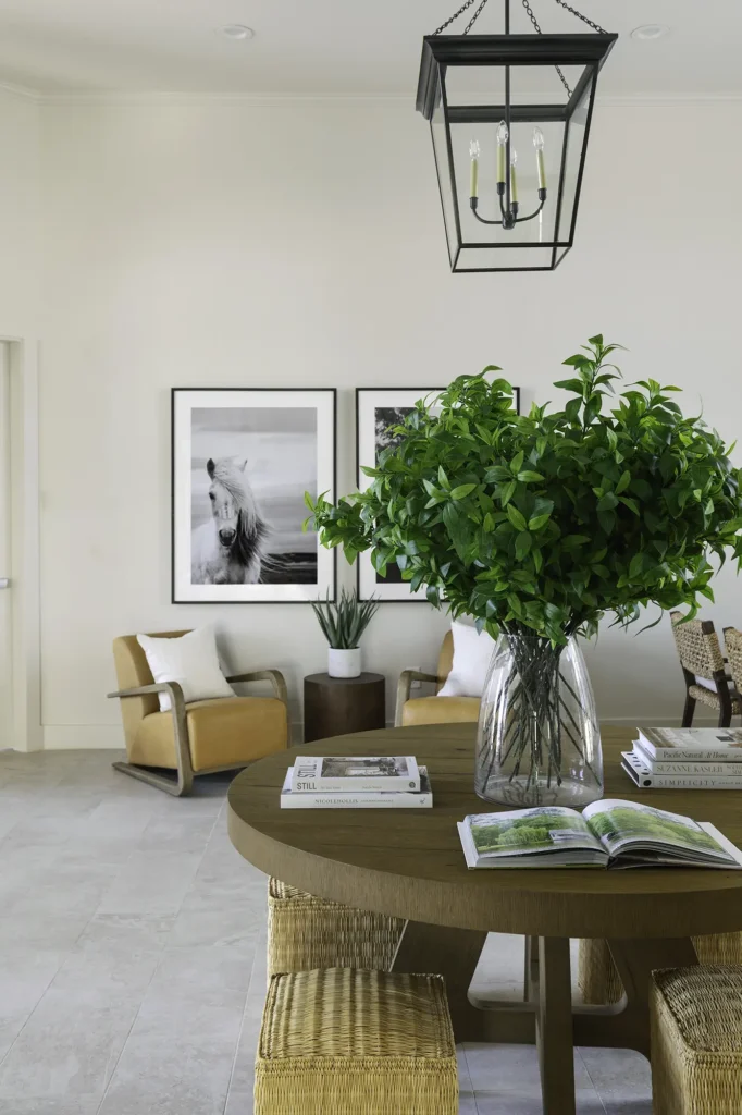 Leasing office lobby with arm chairs and tables