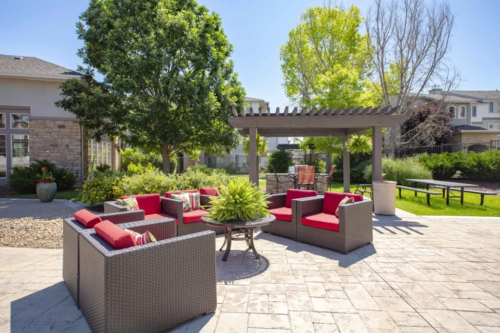 Outdoor patio with grills and lounge seating